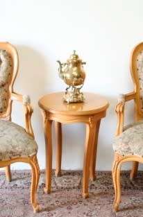 A stunning round vintage Oak occasional/side table with carved detailing.