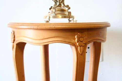 A stunning round vintage Oak occasional/side table with carved detailing.