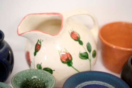 **RS17** A lovely assorted "job lot" of little pottery bowls, jugs and candle holders etc.
