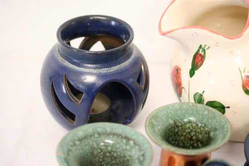 **RS17** A lovely assorted "job lot" of little pottery bowls, jugs and candle holders etc.