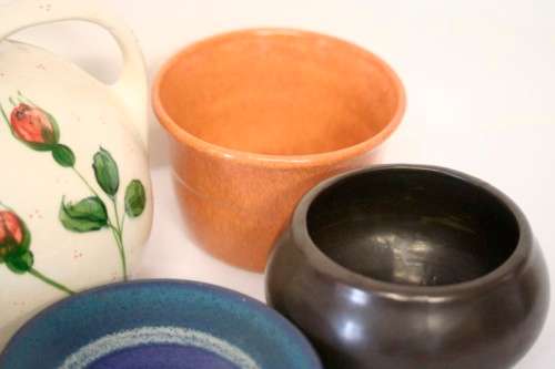 **RS17** A lovely assorted "job lot" of little pottery bowls, jugs and candle holders etc.