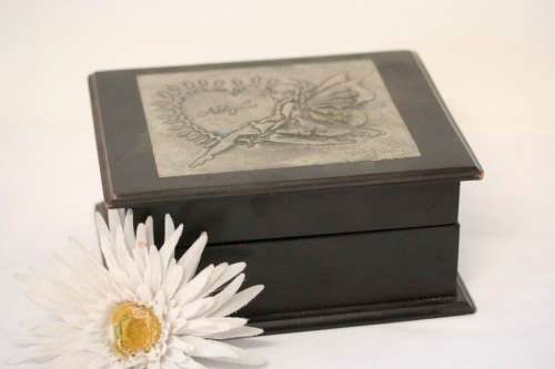 **RS17** A wood and metal top "Fairy" engraved jewellery box with a lined interior and hinged lid
