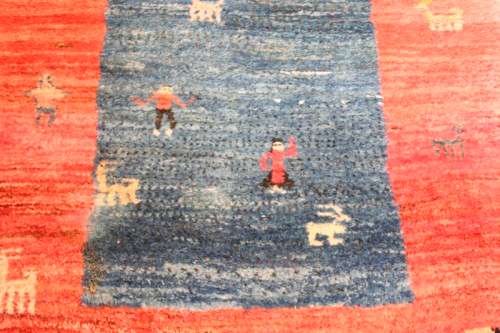 A fabulous thick pile colourful carpet in shades of red and blue colours.