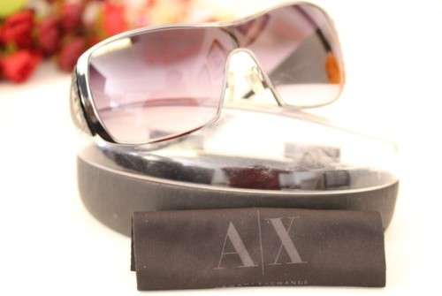 An incredible pair of black Armani Exchange (model AX008NS) unisex sunglasses in its original box
