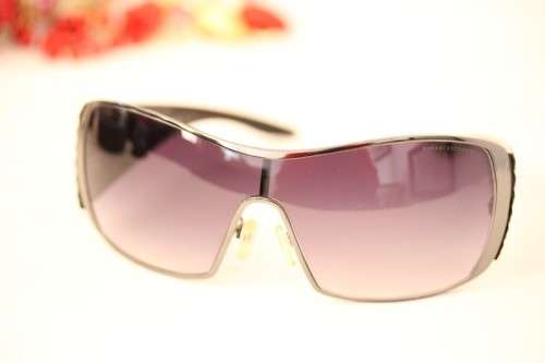An incredible pair of black Armani Exchange (model AX008NS) unisex sunglasses in its original box