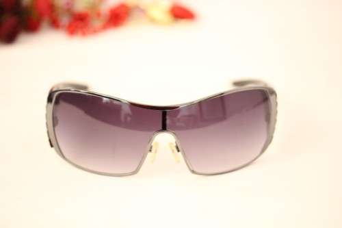 An incredible pair of black Armani Exchange (model AX008NS) unisex sunglasses in its original box