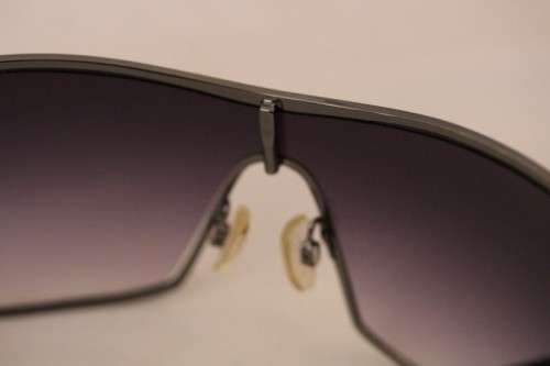 An incredible pair of black Armani Exchange (model AX008NS) unisex sunglasses in its original box