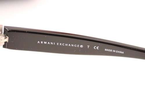 **rs17** A pair of black Armani Exchange (model AX2007) unisex sunglasses in its original case