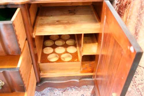 A stunning large vintage side server w/ three large drawers and place for 10 bottles of wine
