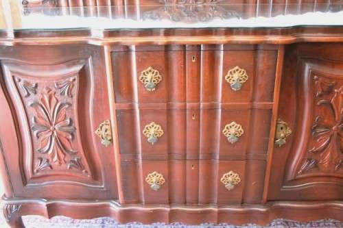 A stunning large vintage side server w/ three large drawers and place for 10 bottles of wine