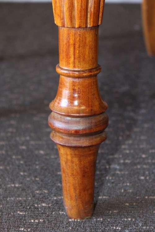 A magnificent Balinese Teak 8-seater dining suite with stylish upholstered curved-back chairs