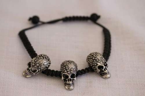 **RS17** An awesome & unusual skull necklace w/ black stones & diamante & a "skull" bracelet