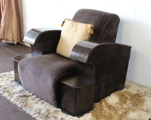 An incredible and rare Art Deco "club" armchair with drinks-rest in a rich chocolate brown fabric