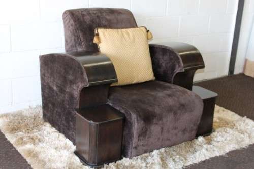 An incredible and rare Art Deco "club" armchair with drinks-rest in a rich chocolate brown fabric