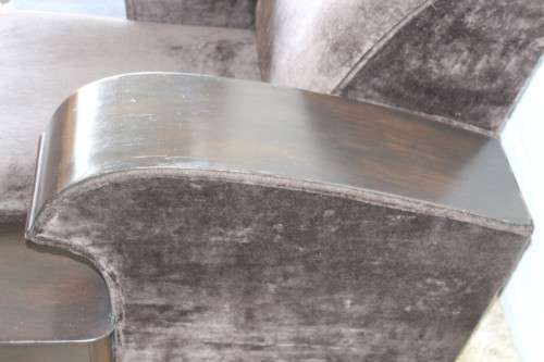 An incredible and rare Art Deco "club" armchair with drinks-rest in a rich chocolate brown fabric