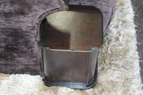 An incredible and rare Art Deco "club" armchair with drinks-rest in a rich chocolate brown fabric