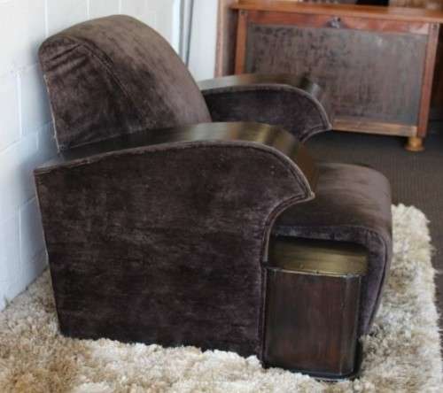 An incredible and rare Art Deco "club" armchair with drinks-rest in a rich chocolate brown fabric