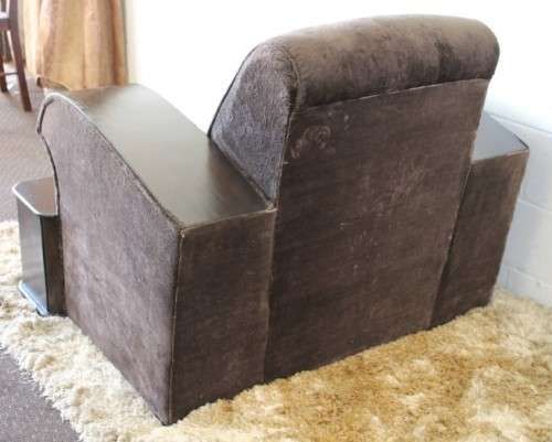 An incredible and rare Art Deco "club" armchair with drinks-rest in a rich chocolate brown fabric