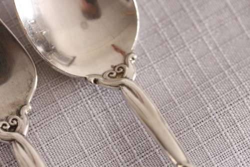 A beautiful antique sterling silver Art Nouveau (c1895 to 1910) USA made fruit spoon & fork set