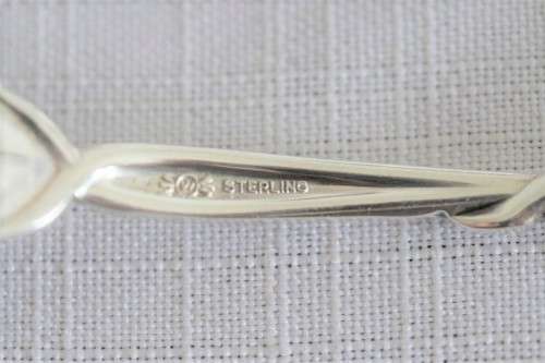 A beautiful antique sterling silver Art Nouveau (c1895 to 1910) USA made fruit spoon & fork set