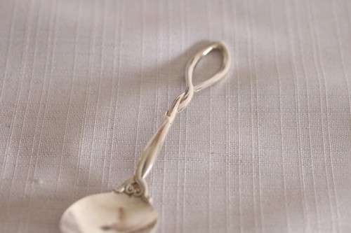 A beautiful antique sterling silver Art Nouveau (c1895 to 1910) USA made fruit spoon & fork set