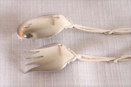 A beautiful antique sterling silver Art Nouveau (c1895 to 1910) USA made fruit spoon & fork set
