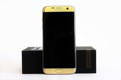 **RS17** Samsung Galaxy S7 Edge w/ cover in the original box w/ charger - great working condition!!