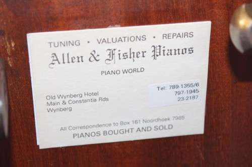 A spectacular antique Edwardian "John Brinsmead & Sons" upright piano - elegant addition to a lounge