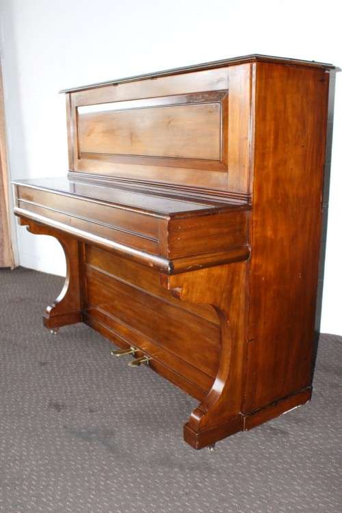 A spectacular antique Edwardian "John Brinsmead & Sons" upright piano - elegant addition to a lounge