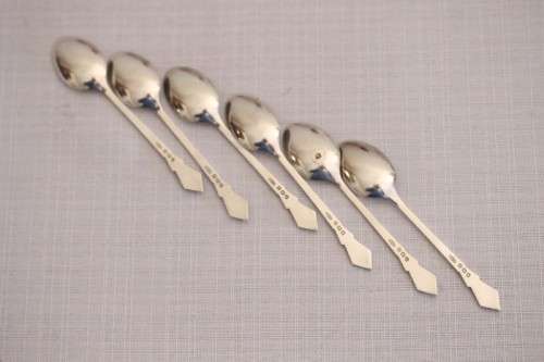 A superb set of 6x original Art Deco hallmarked sterling silver demitasse spoons w/ enamel detailing