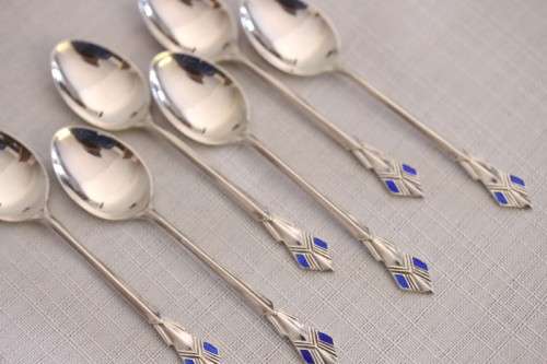 A superb set of 6x original Art Deco hallmarked sterling silver demitasse spoons w/ enamel detailing