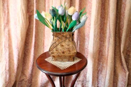 A fabulous stylish vintage Teak display/ occasional table with a ornate centre leg