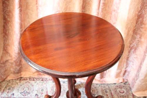 A fabulous stylish vintage Teak display/ occasional table with a ornate centre leg