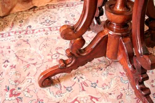 A fabulous stylish vintage Teak display/ occasional table with a ornate centre leg