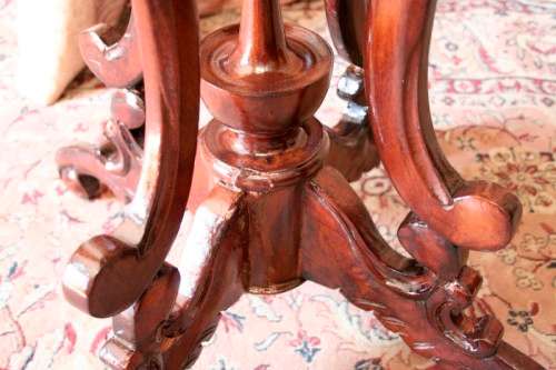A fabulous stylish vintage Teak display/ occasional table with a ornate centre leg