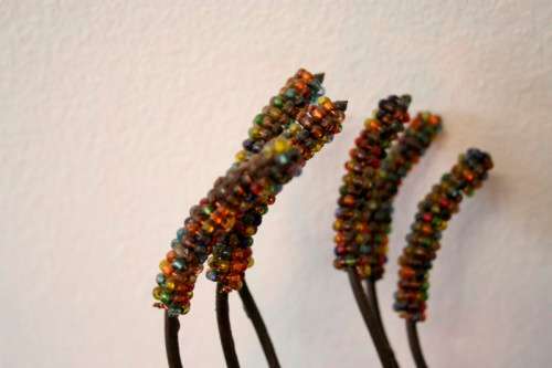 **RS17** A stunning tall beaded metal candle holder in great condition - great for ambience lighting