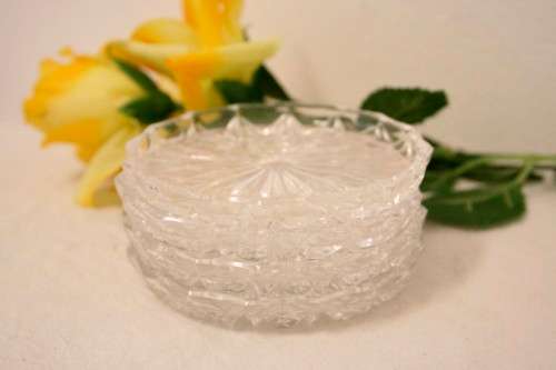 A set of four beautiful ornate glass coasters in stunning condition- RS17Sale