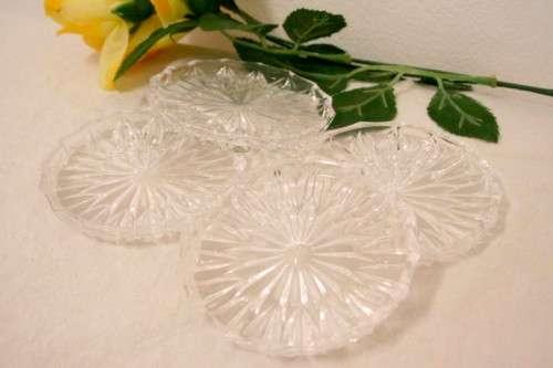 A set of four beautiful ornate glass coasters in stunning condition- RS17Sale