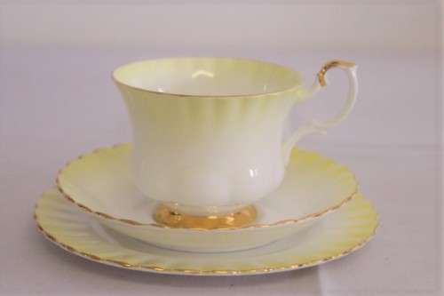 A gorgeous vintage Royal Albert porcelain trio in the beautiful "Rainbow Yellow" pattern