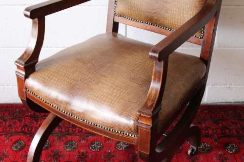 A magnificent and RARE Edwardian office chair with incredible marquetry inlay detailing on castors!!