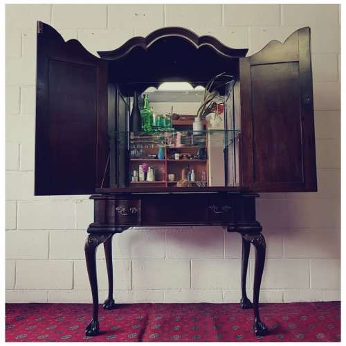 Magnificent tall Imbuia cocktail cabinet w/ a fold-down serving shelf & ball & claw legs - RS17Sale