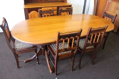 A superb Yellowwood and Imbuia dining room suite including table, 6x chairs & buffet server cabinet!