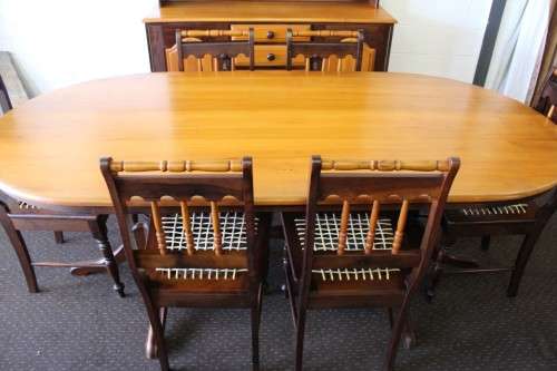 A superb Yellowwood and Imbuia dining room suite including table, 6x chairs & buffet server cabinet!