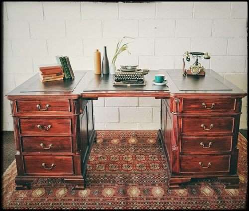 A magnificent vintage Georgian-style Rosewood 10-drawer partners desk w carved detailing - STUNNING!