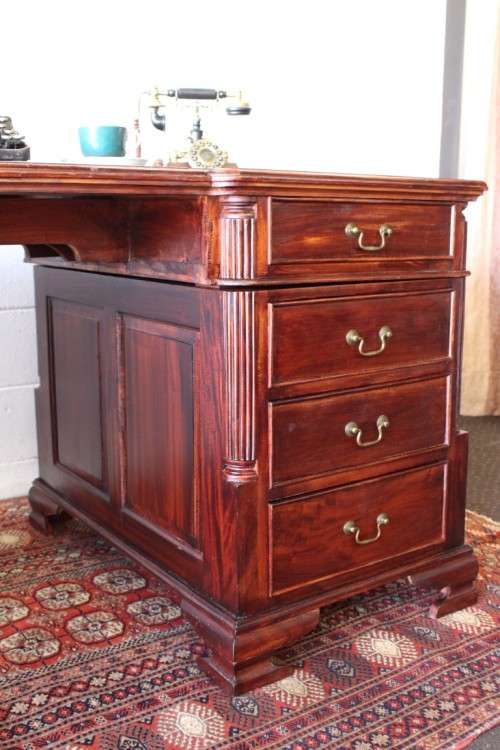 A magnificent vintage Georgian-style Rosewood 10-drawer partners desk w carved detailing - STUNNING!