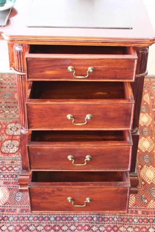 A magnificent vintage Georgian-style Rosewood 10-drawer partners desk w carved detailing - STUNNING!