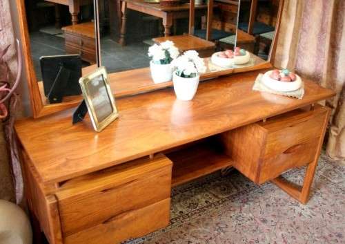 An exquisite Teak retro styled four drawer side-folding mirror dressing table and stool.