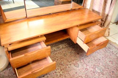 An exquisite Teak retro styled four drawer side-folding mirror dressing table and stool.