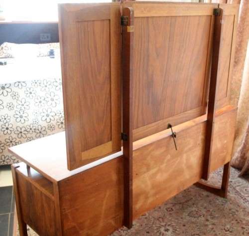 An exquisite Teak retro styled four drawer side-folding mirror dressing table and stool.