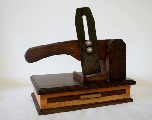 An awesome wooden biltong cutter with a pullout board , perfect in the bar area or in the lapa etc!